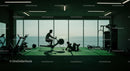 Silhouettes Working Out in Gym with Ocean View
