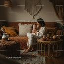 Mother Holding Baby in Cozy Bohemian Living Room