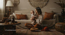 Mother and Baby in Cozy Bohemian Living Room