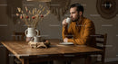 Man Enjoying Coffee in Cozy Rustic Dining Room
