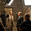Actors in Dialogue on a Movie Set with Film Crew
