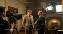 Actors in Dialogue on a Movie Set with Film Crew