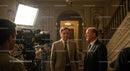 Actors in Dialogue on a Movie Set with Film Crew