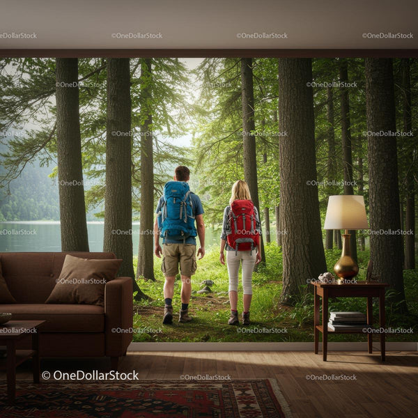Couple Hiking Through Lush Green Forest Path