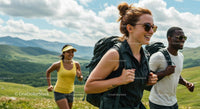 Group of Friends Hiking Through Lush Green Mountains