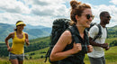 Group of Smiling Hikers in Scenic Mountain Landscape