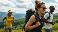 Group of Smiling Hikers in Scenic Mountain Landscape