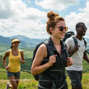 Group of Friends Hiking Through Scenic Mountain Trails
