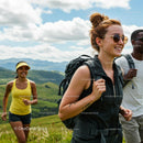 Energetic Group Hiking in Lush Mountain Landscape