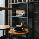 Latte Art in Cozy Coffee Shop with Vintage Charm