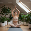 Woman Practicing Yoga Surrounded by Lush House Plants