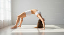 Woman Practicing Bridge Pose in Sunlit Room