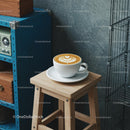 Latte Art on Wooden Stool in Cozy Cafe Setting