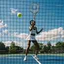 Female Tennis Player in Action on Outdoor Court