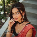 Young Woman in Traditional Attire with Elegant Jewelry