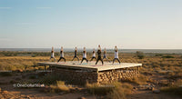 Group Yoga Practice on Elevated Outdoor Platform in Desert