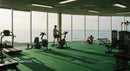 Scenic Gym with Ocean View and Modern Equipment