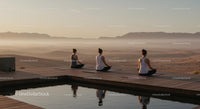 Women Meditating Peacefully on Desert Deck at Sunrise