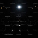 Empty Cinema Hall with Spotlight on Seats