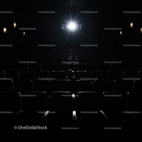 Empty Cinema Hall with Spotlight on Seats
