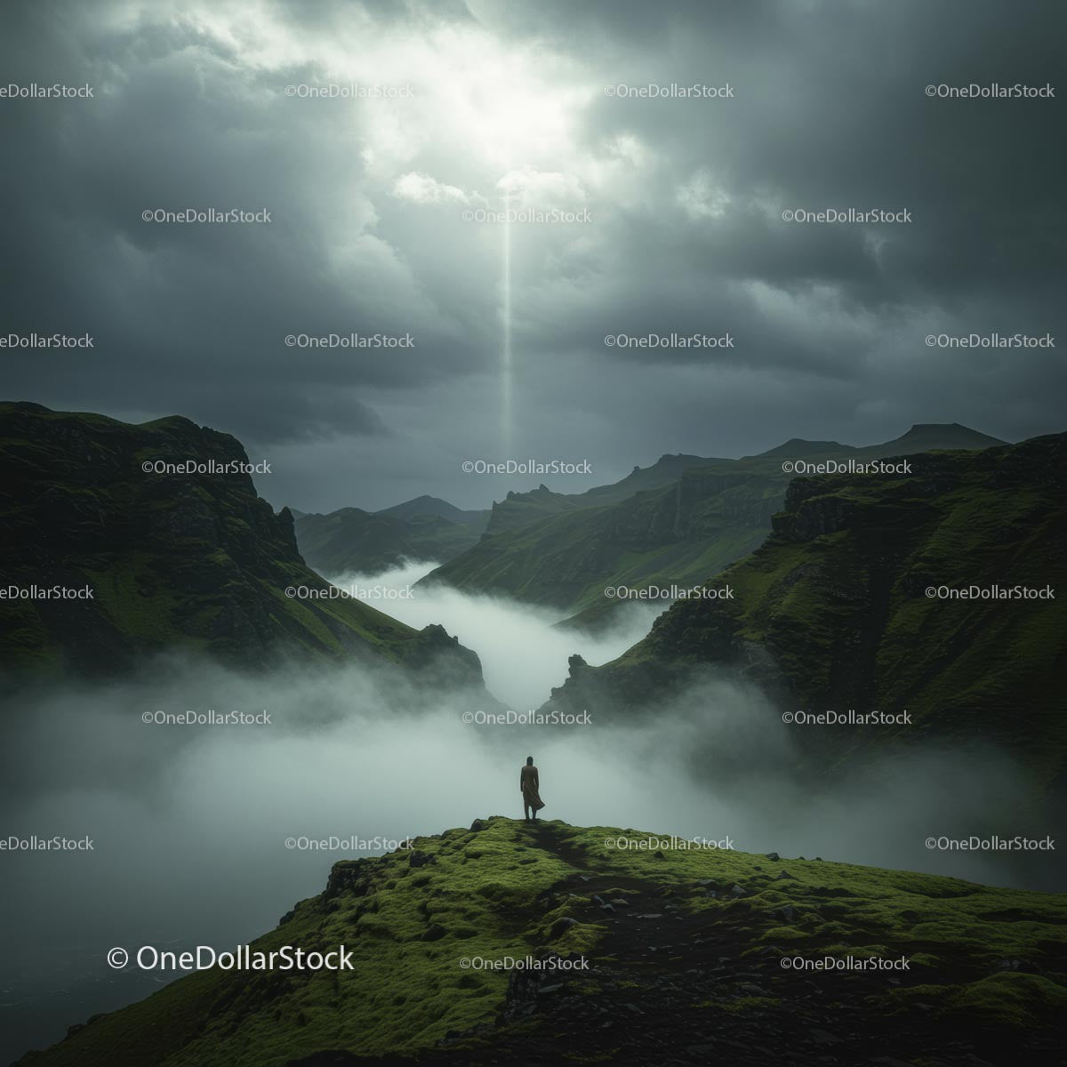 Lone Explorer Amidst Misty Mountain Range with Sunbeam