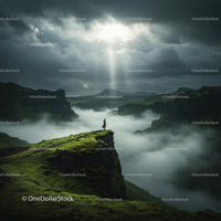 Solitary Figure on Misty Mountain Peak