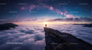 Person on Mountain Peak Under Starry Night Sky