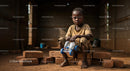 Child with Homemade Toy Car on Bricks