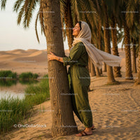 Woman Enjoying Oasis Serenity Among Palm Trees