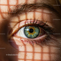 Close-Up of Eye with Intricate Shadow Pattern