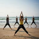 Group Yoga Session on a Tranquil Beach