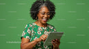 Happy Woman Using Tablet Against Green Background