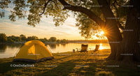 Sunlit Camping Spot by a Serene Lake at Sunset