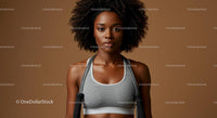 Athletic Woman with Afro Hairstyle Holding Jump Rope