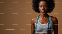 Confident Woman with Jump Rope Ready for Workout