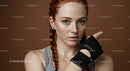 Freckled Fitness Woman with Braided Hairstyle and Gym Glove