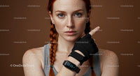 Freckled Fitness Woman with Braided Hairstyle and Gym Glove
