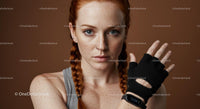 Determined Red-Haired Woman in Fitness Attire