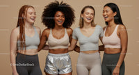 Diverse Women in Trendy Activewear Smiling Together