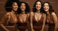 Four Happy Women Laughing Together in Brown Swimsuits
