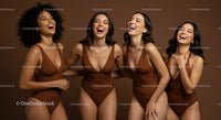 Group of Diverse Women Laughing in Brown Swimwear