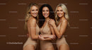 Three Confident Women Posing in Stylish Swimwear
