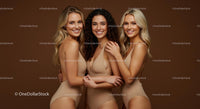 Three Confident Women Posing in Stylish Swimwear