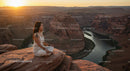 Woman Meditating at Sunset on Canyon Edge