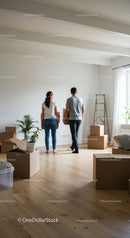 Couple Moving into New Home with Cardboard Boxes
