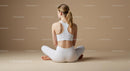 Woman Meditating in Brown Outfit on Yoga Mat
