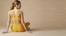 Woman Meditating in Brown Outfit on Yoga Mat