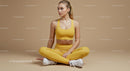 Woman Meditating in Brown Outfit on Yoga Mat
