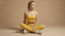 Woman Meditating in Brown Outfit on Yoga Mat