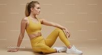 Woman Meditating in Brown Outfit on Yoga Mat
